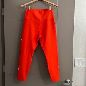 NWOT peloton workout leggings, L, orange